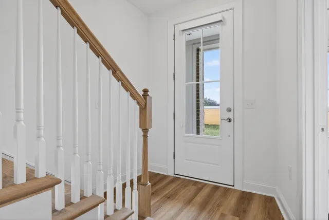 an empty room with a bathroom and a sink