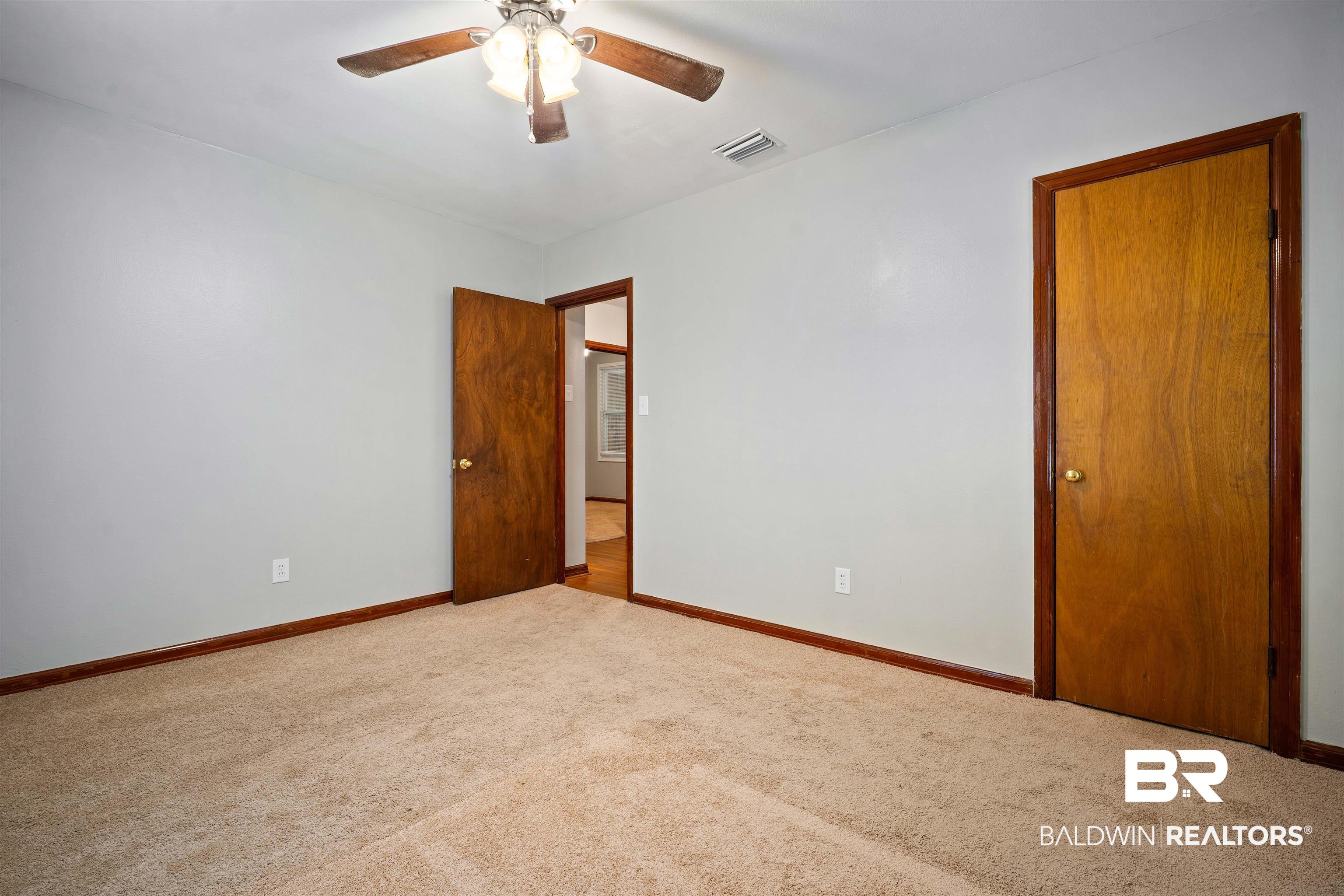 9 Elizabeth Avenue Mobile, AL 36611 - Photo 17 of 19 Spare room with carpet and ceiling fan