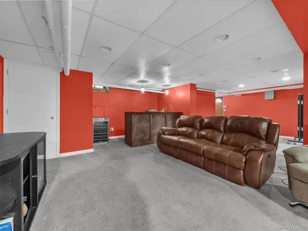 a living room with furniture and a couch