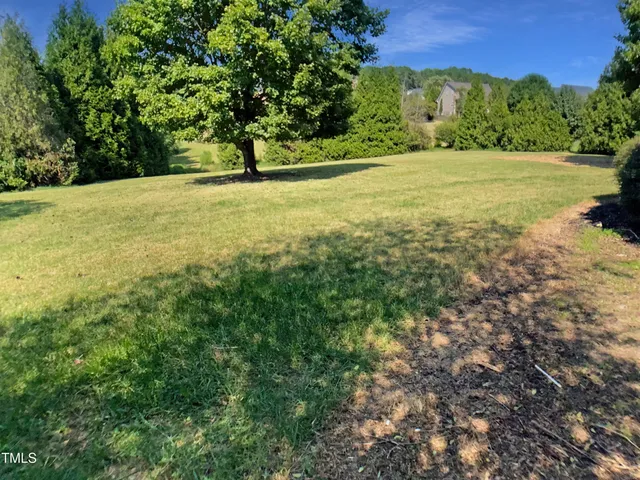 a view of an outdoor space and a yard