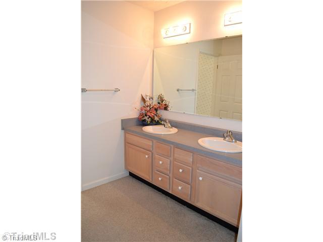 196 Setliff Road Reidsville, NC 27320 - Photo 6 of 12 Master Bath/Spa. Master bath offers his and her sinks, soaking tub, separate shower and walk-in closet.