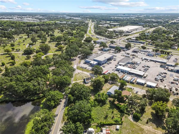 an aerial view of residential building and trees
