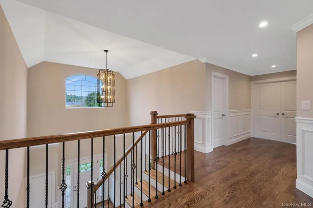 a view of entryway with wooden floor
