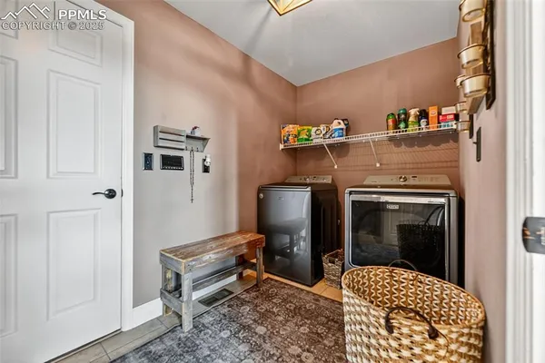 a room with furniture and a rug