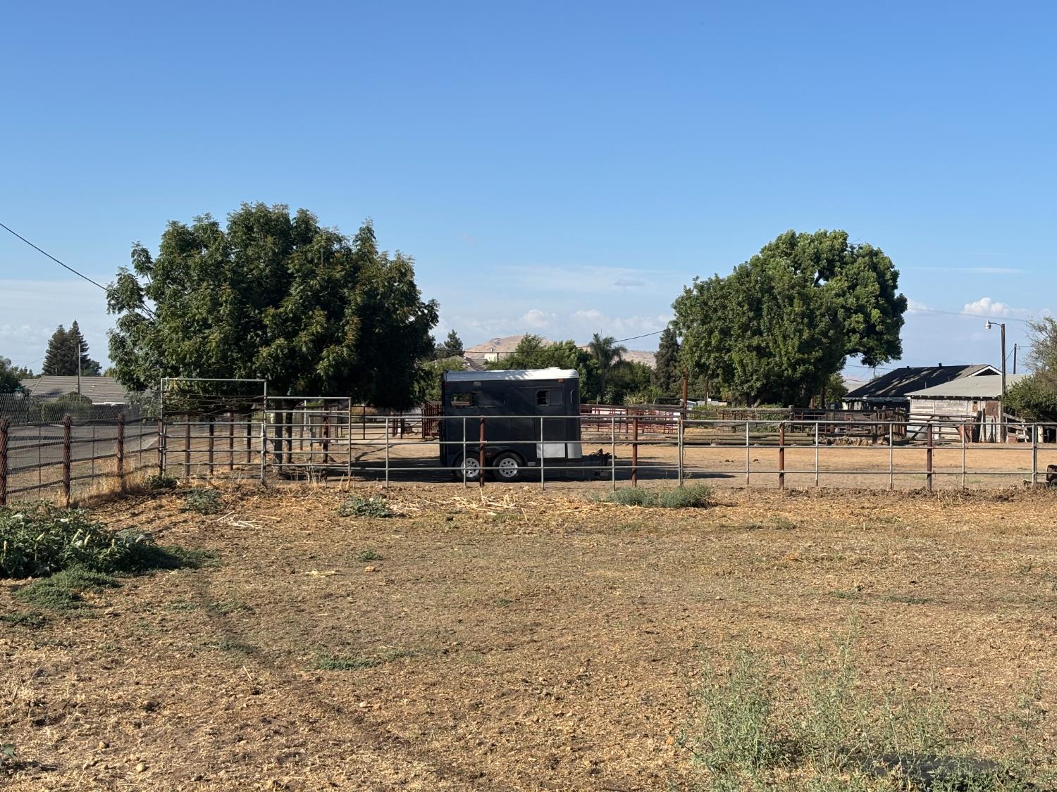 19317 East Parlier Avenue Reedley, CA 93654 - Photo 29 of 36 a view of a backyard