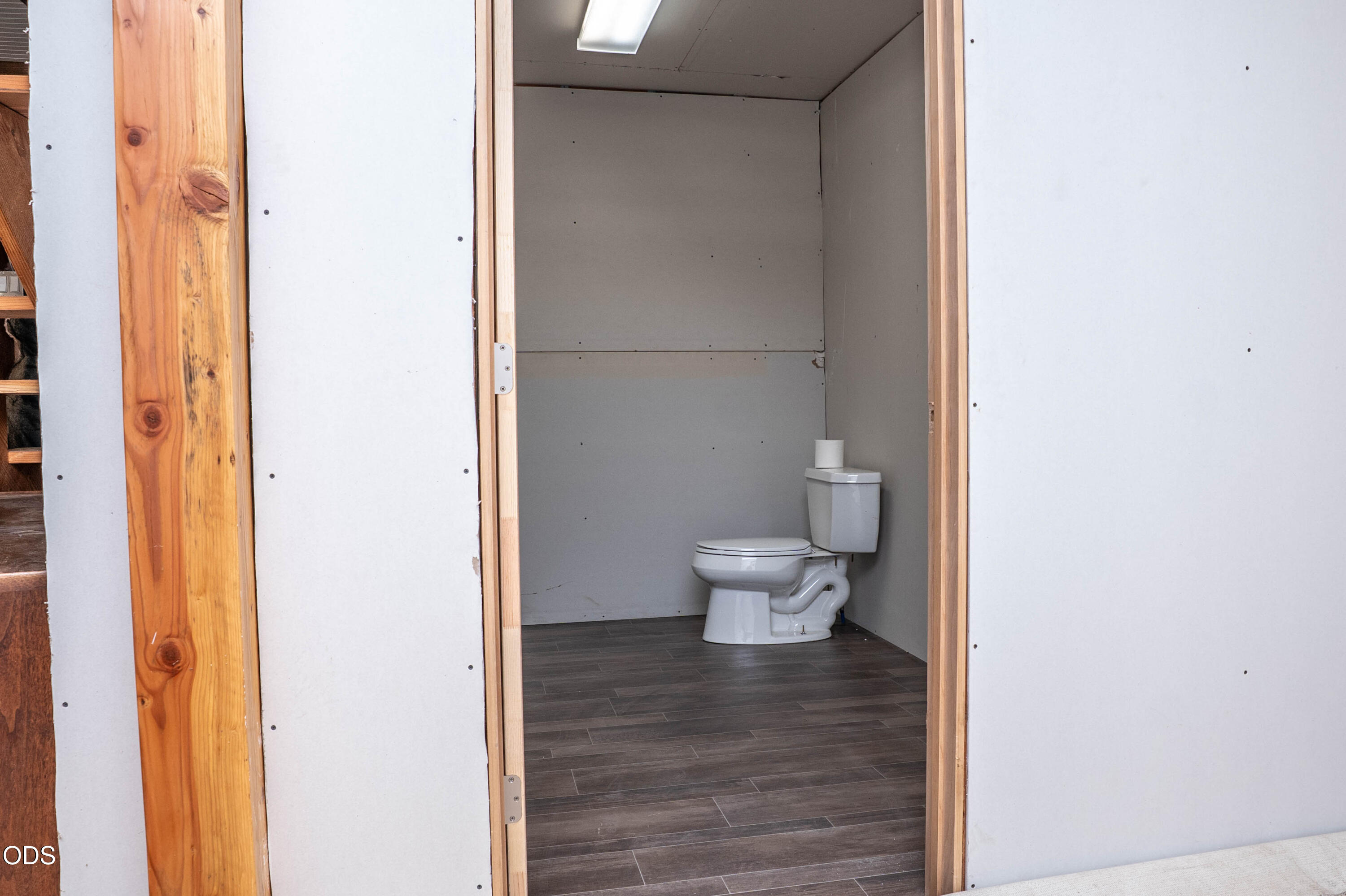 8245 Jumpoff Joe Creek Road Grants Pass, OR 97526 - Photo 19 of 43 a bathroom with a toilet