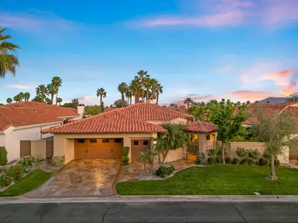a bathroom with a bathtub and a window
