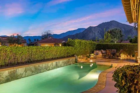a view of a lake in middle of the house