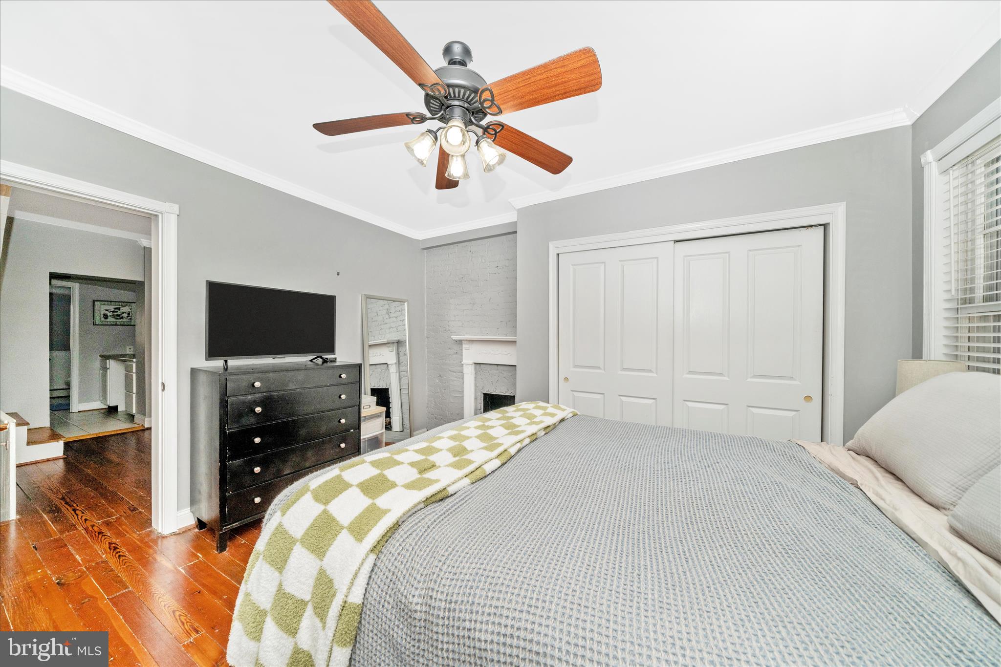 313 North Market Street Frederick, MD 21701 - Photo 20 of 40 a bedroom with a bed and a flat screen tv