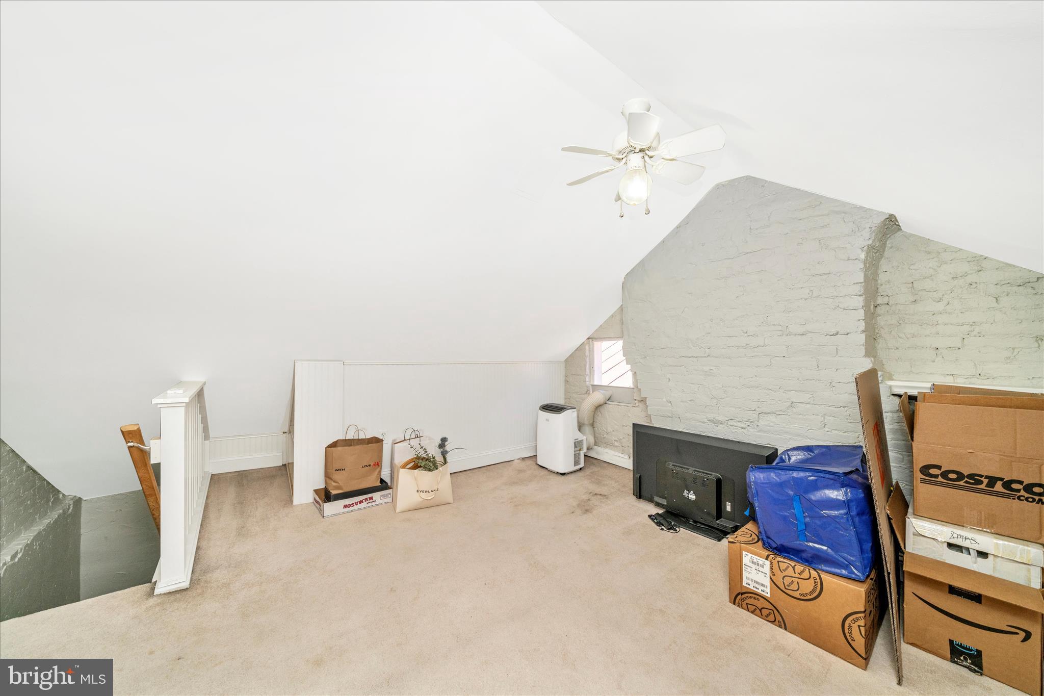 313 North Market Street Frederick, MD 21701 - Photo 28 of 40 a living room with furniture and a fireplace