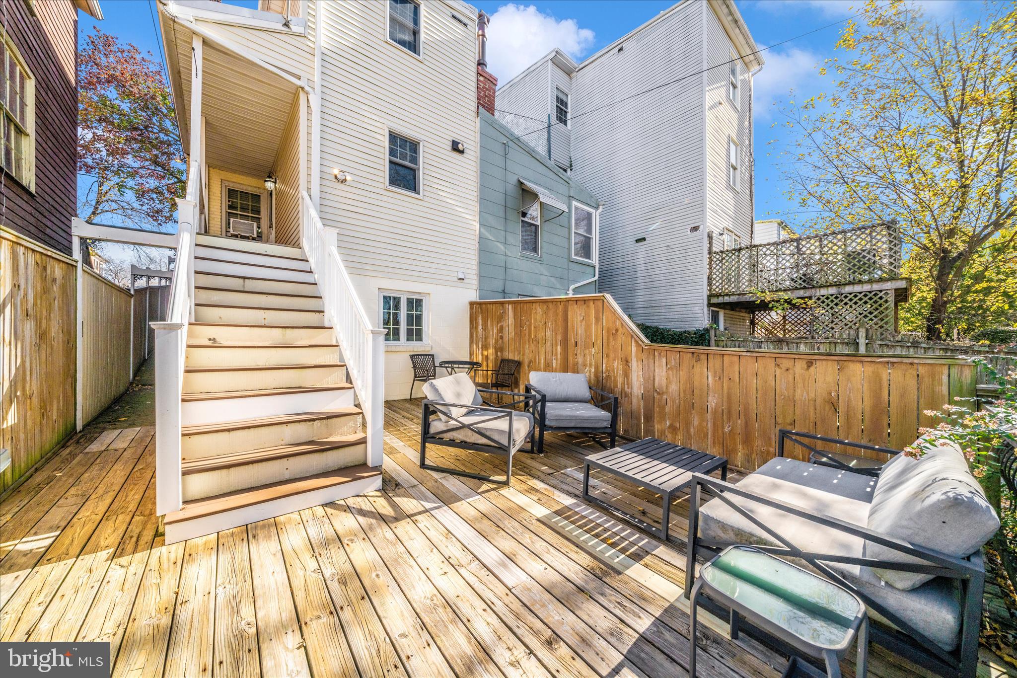 313 North Market Street Frederick, MD 21701 - Photo 31 of 40 a view of a patio with couches chairs and wooden floor