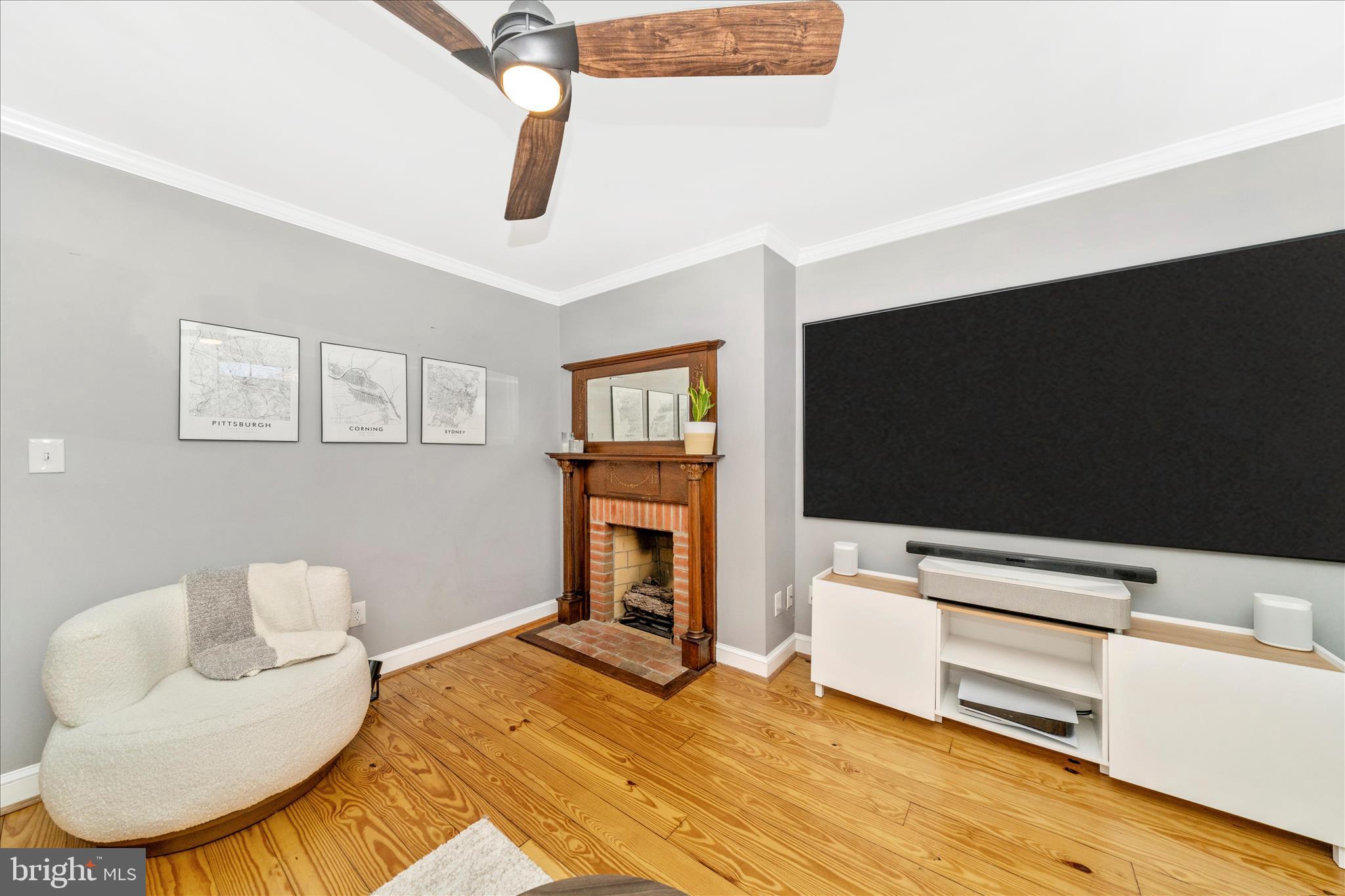 313 North Market Street Frederick, MD 21701 - Photo 7 of 40 a bedroom with furniture and a flat screen tv
