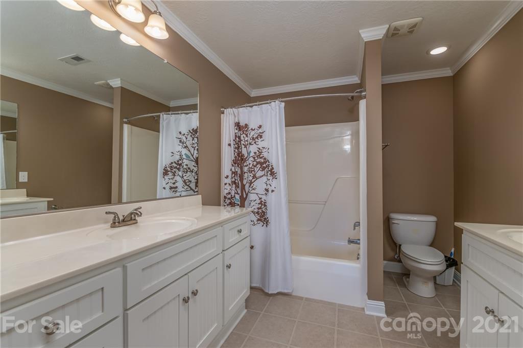 137 Green Pastures Drive Rutherfordton, NC 28139 - Photo 22 of 35 a bathroom with a sink a toilet and shower