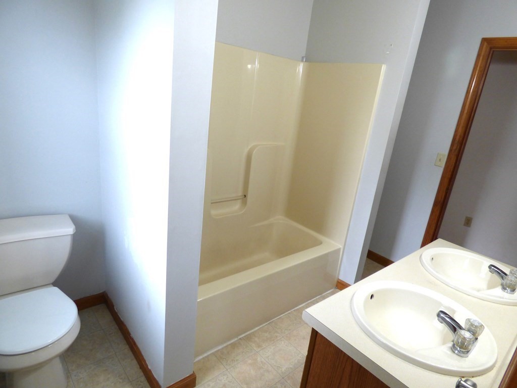 6 Devonshire Road Springfield, MA 01109 - Photo 11 of 23 a bathroom with a sink and a toilet
