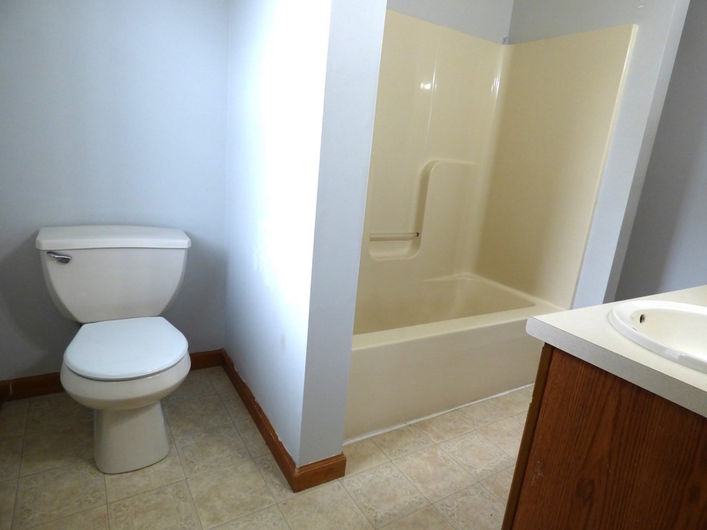 6 Devonshire Road Springfield, MA 01109 - Photo 12 of 23 a bathroom with a sink and a toilet