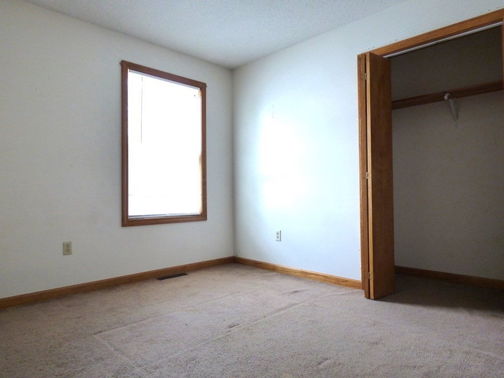 6 Devonshire Road Springfield, MA 01109 - Photo 13 of 23 an empty room with a window