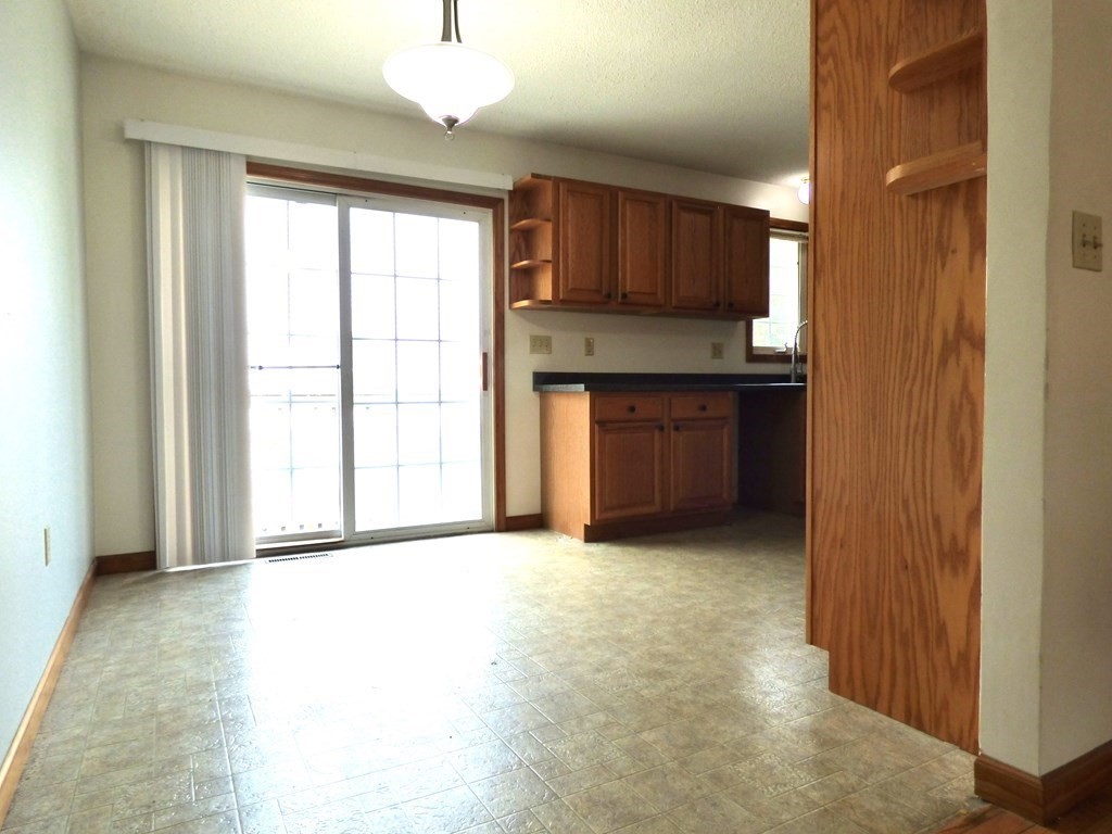 6 Devonshire Road Springfield, MA 01109 - Photo 5 of 23 a view of a kitchen with a sink and a window