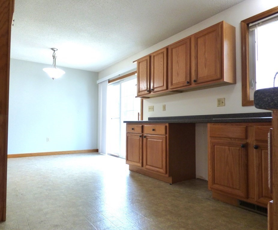 6 Devonshire Road Springfield, MA 01109 - Photo 8 of 23 a view of a kitchen with electric appliances