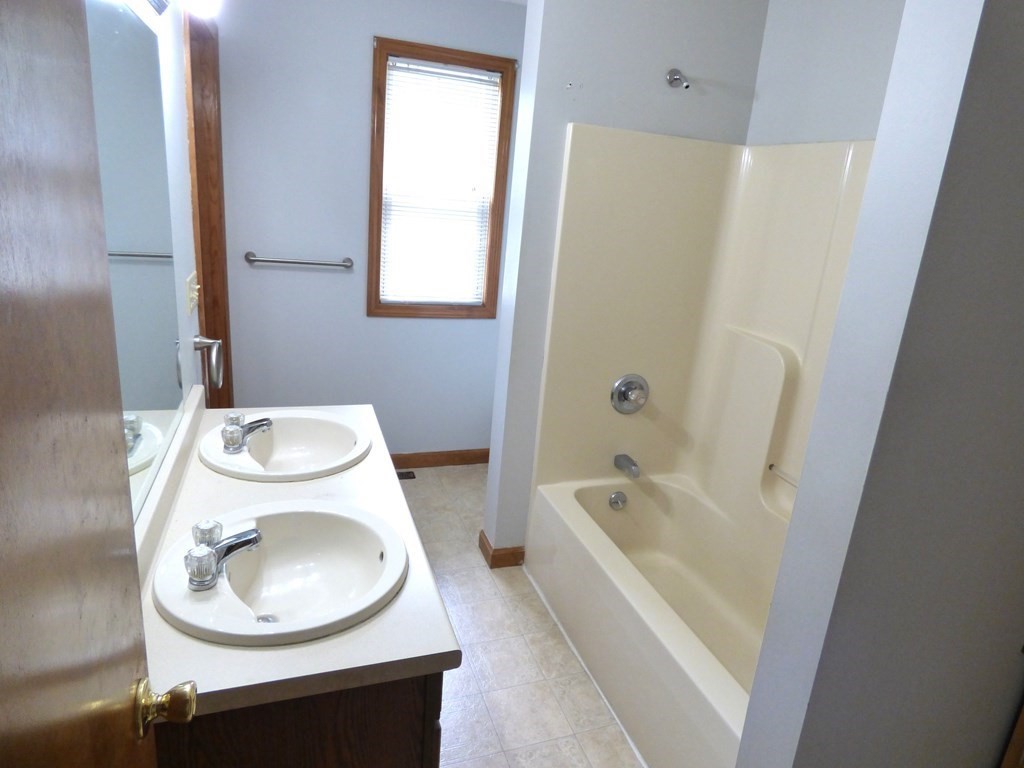 6 Devonshire Road Springfield, MA 01109 - Photo 10 of 23 a bathroom with a sink toilet and bathtub