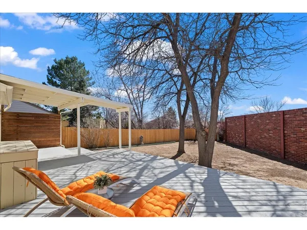 a view of a backyard of the house
