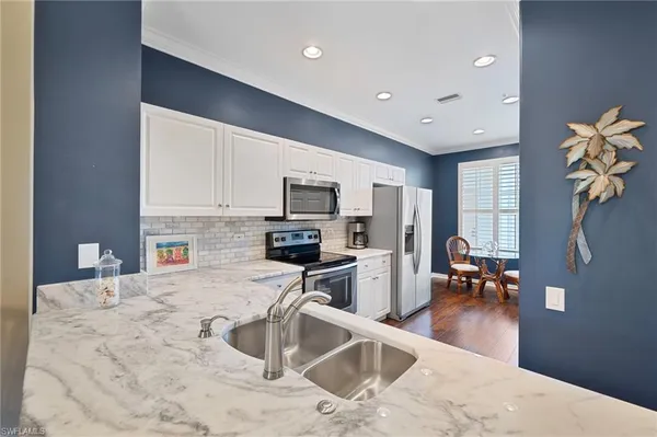 $325,000 | 8253 Parkstone Place, Unit 106, Naples, FL 34120