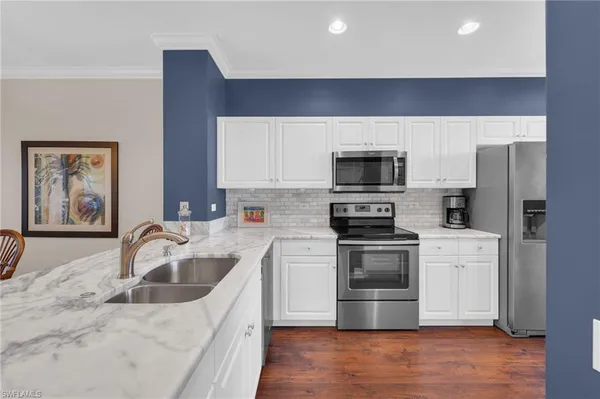 $325,000 | 8253 Parkstone Place, Unit 106, Naples, FL 34120