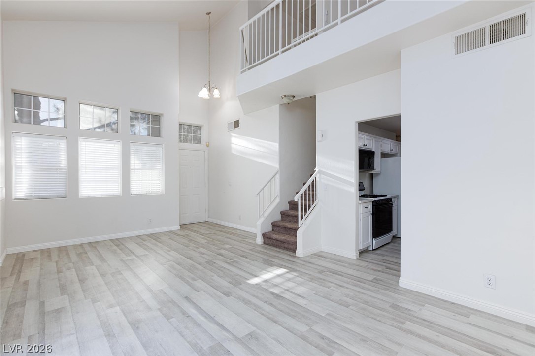 2246 Ramsgate Drive Henderson, NV 89074 - Photo 6 of 36 Lofty ceilings and generous windows illuminate this versatile living space.