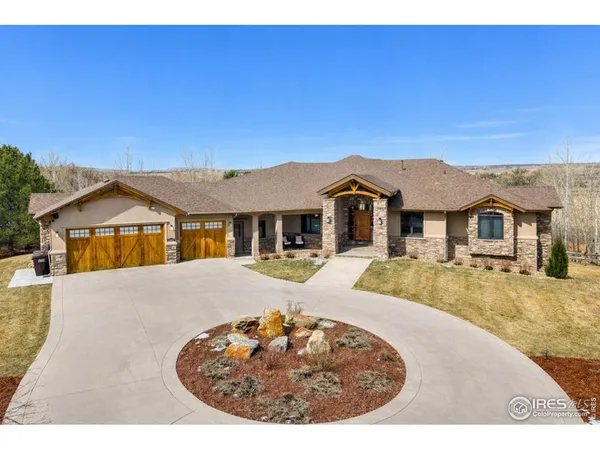 a view of a house with swimming pool and porch