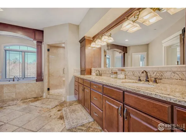 a view of a bathroom with a glass door shower