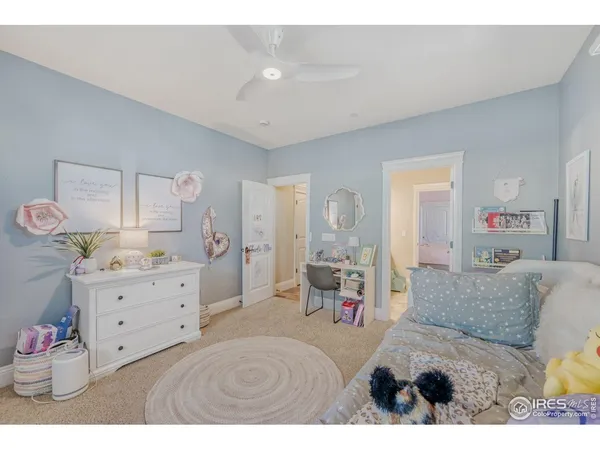 a bed room with a bed and furniture