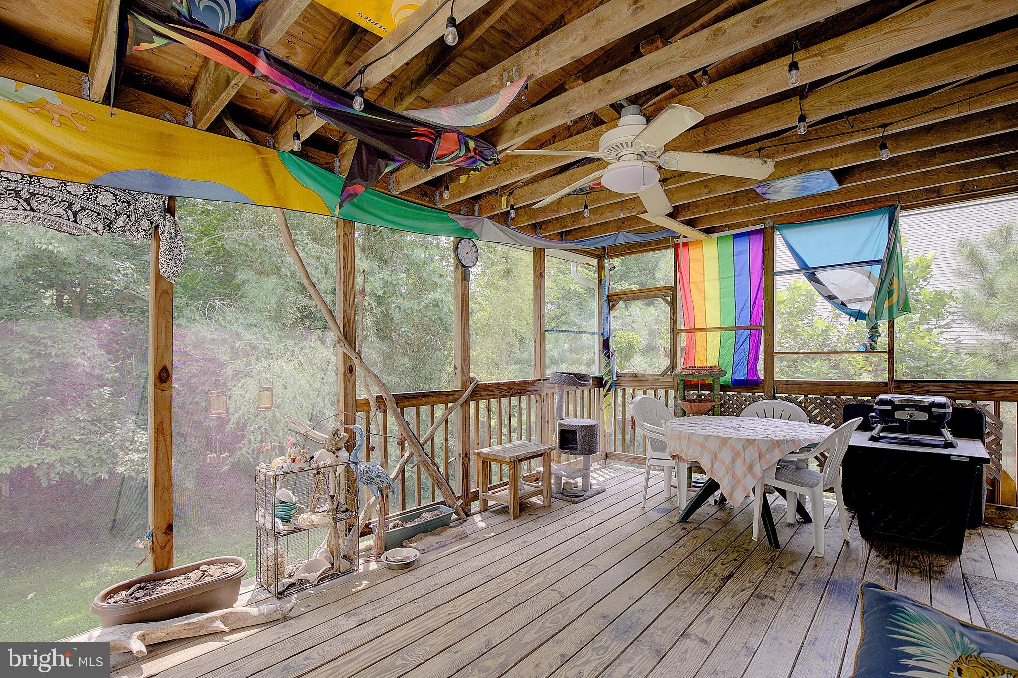 12424 Hisperia Road Lusby, MD 20657 - Photo 34 of 50 Screened porch