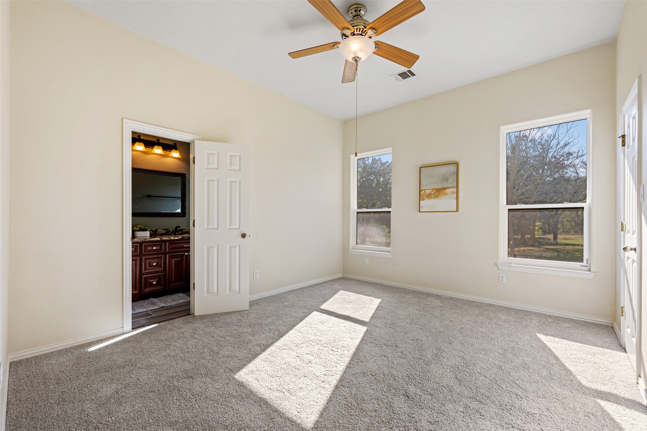 181 Whitney Run Buda, TX 78610 - Photo 27 of 40 Spacious bedroom #3 with walk-in closet.