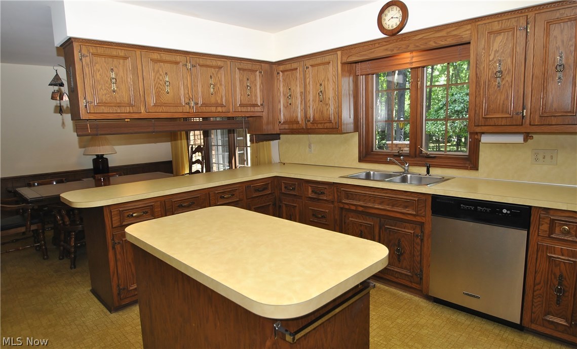 2250 Lancaster Road Akron, OH 44313 - Photo 6 of 35 Alternate view of kitchen & eating area. Located near kitchen is back staircase, half bath and mud room leading to attached garage.