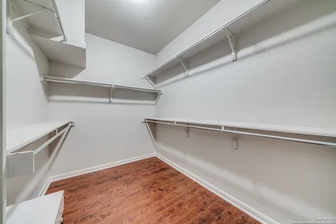 a view of an empty walk in closet