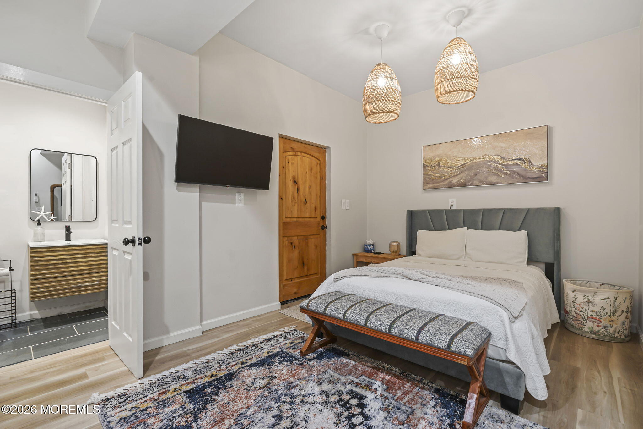 30 2nd Street Highlands, NJ 07732 - Photo 15 of 29 a bedroom with a bed and a television