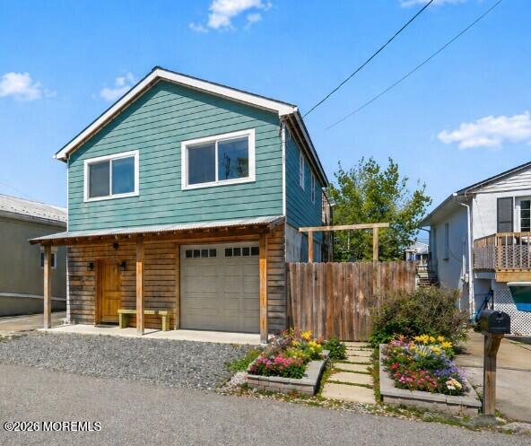 30 2nd Street Highlands, NJ 07732 - Photo 2 of 29 a front view of a house with a yard