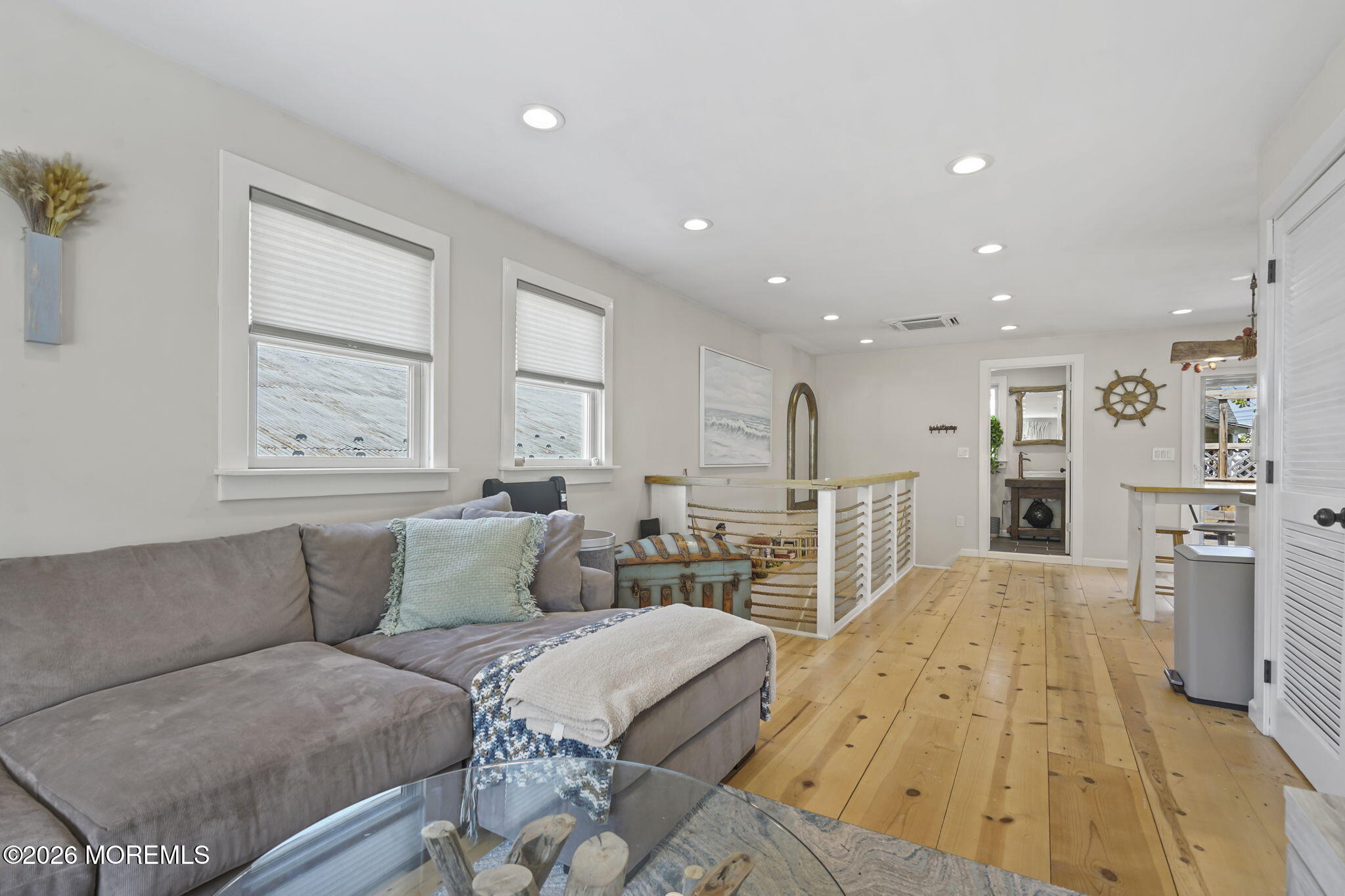 30 2nd Street Highlands, NJ 07732 - Photo 10 of 29 a living room with furniture and a table