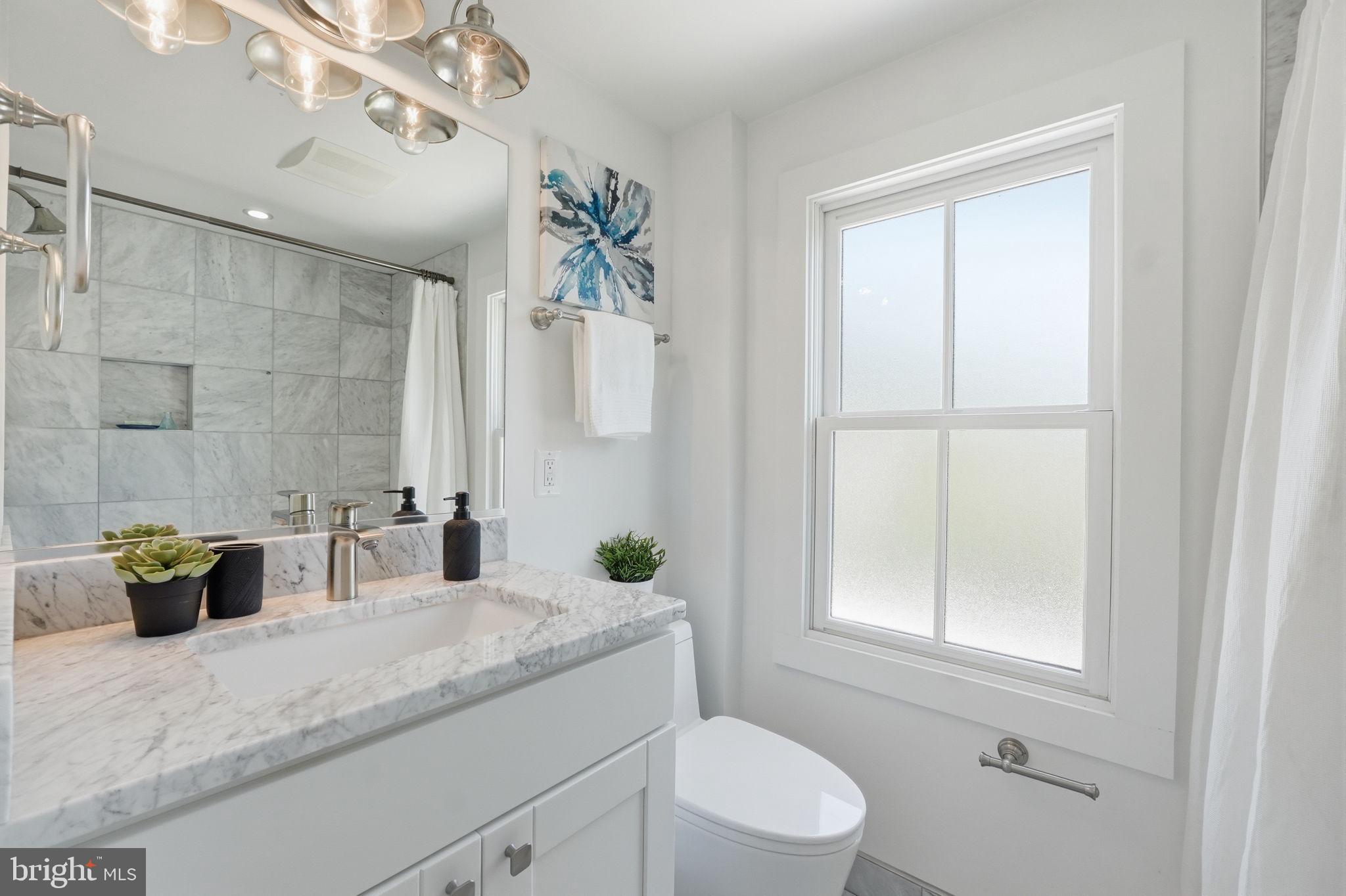 401 11th Street Southeast Washington, DC 20003 - Photo 22 of 38 Second full bathroom on upper level