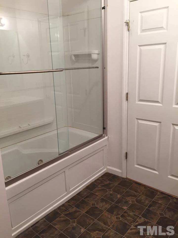 1150 Robertson Road Roxboro, NC 27574 - Photo 17 of 21 a bathroom with a bathtub