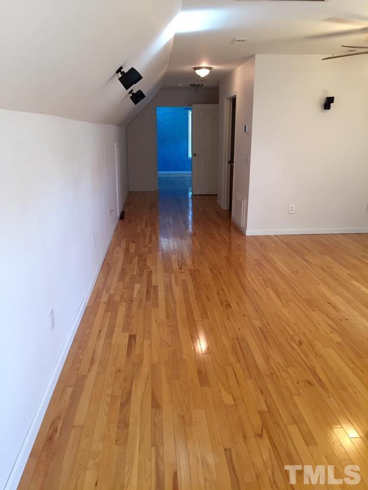 1150 Robertson Road Roxboro, NC 27574 - Photo 6 of 21 a view of a room with wooden floor
