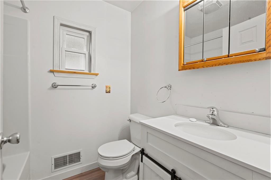 723 Freeport Road Creighton, PA 15030 - Photo 16 of 27 a bathroom with a sink and a toilet