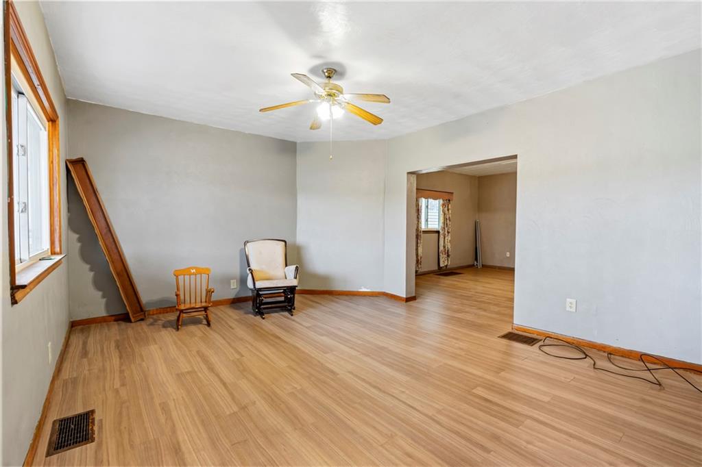 723 Freeport Road Creighton, PA 15030 - Photo 17 of 27 a living room with furniture and a wooden floor