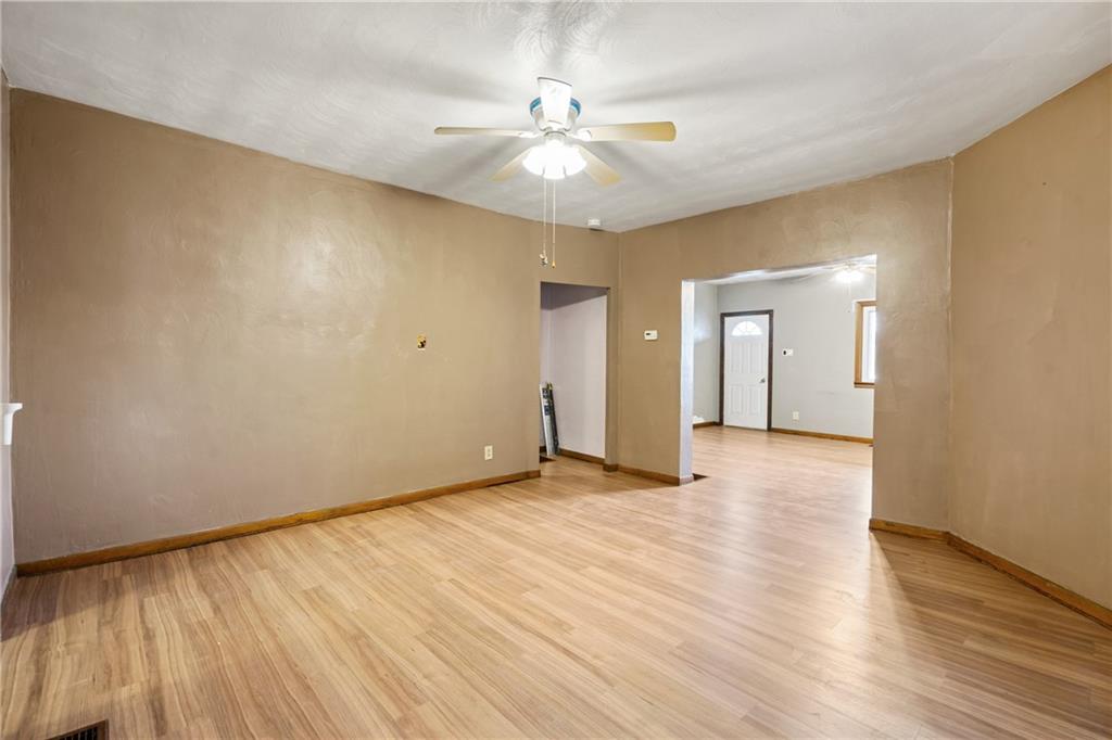 723 Freeport Road Creighton, PA 15030 - Photo 19 of 27 a view of an empty room with wooden floor
