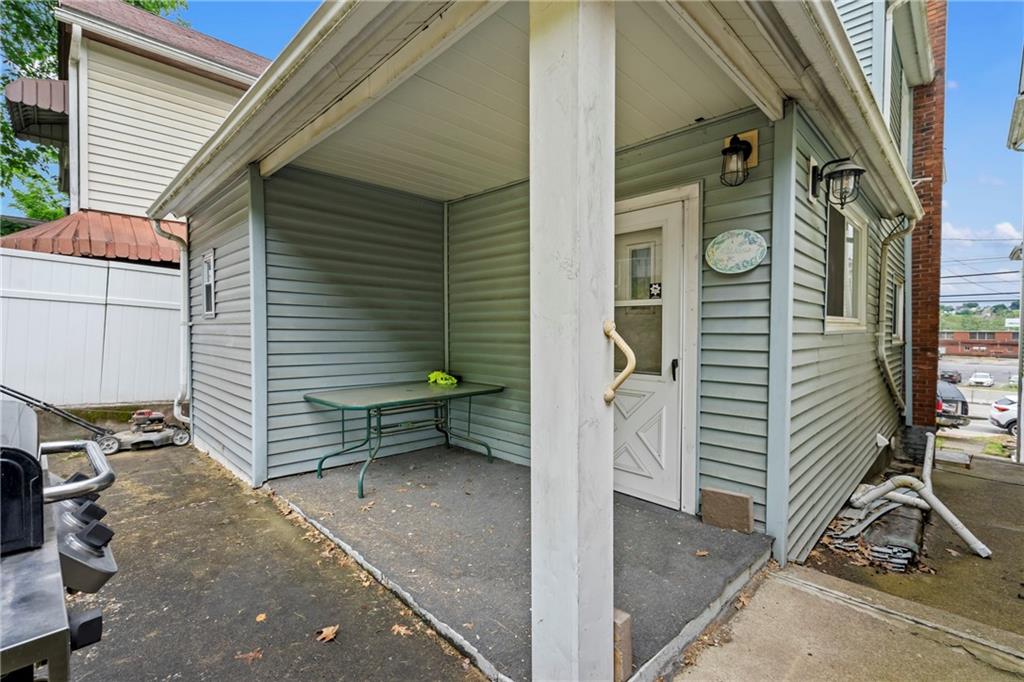 723 Freeport Road Creighton, PA 15030 - Photo 25 of 27 a view of a house with a door and a window