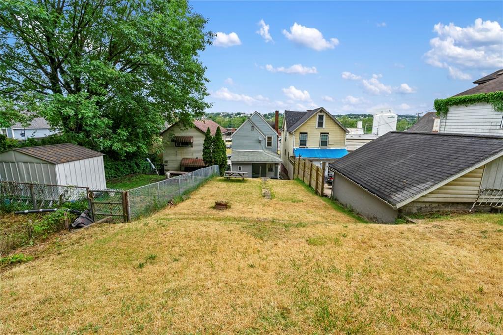 723 Freeport Road Creighton, PA 15030 - Photo 27 of 27 a view of an house with backyard and a tree