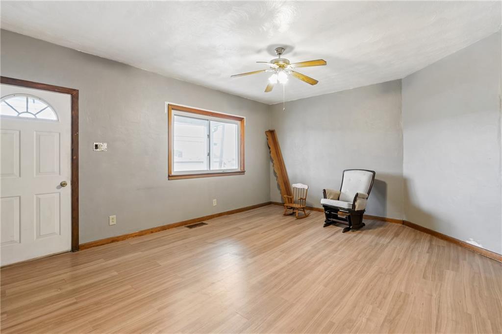 723 Freeport Road Creighton, PA 15030 - Photo 10 of 27 a view of a room with a window and wooden floor