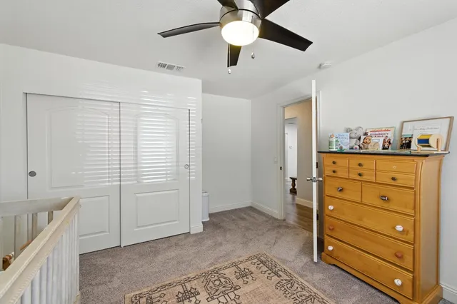 a view of a bedroom with closet