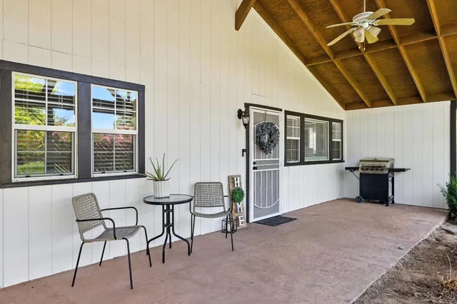 a workspace with furniture and window