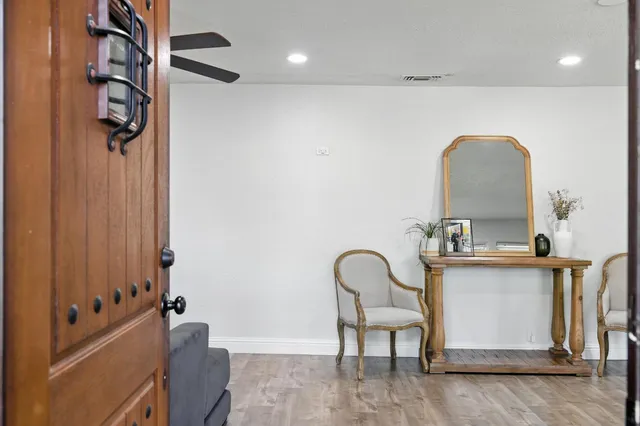 a room with a table and chairs