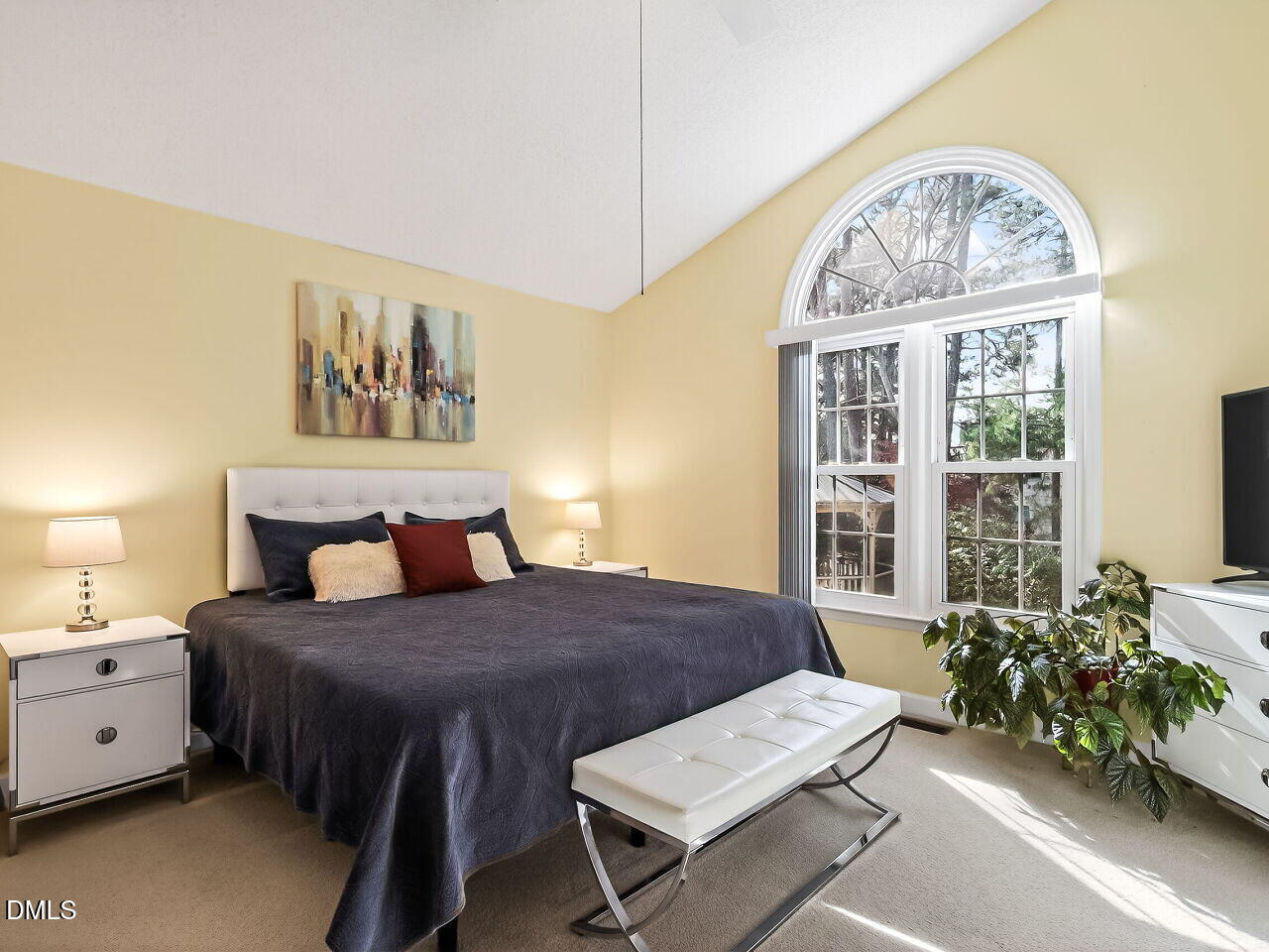 5 Flagstaff Court Durham, NC 27713 - Photo 15 of 40 a bedroom with a bed table and a window